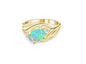 18kt Yellow Gold Black Opal and Diamond slanted ring