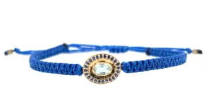 Aquamarine and Blue Sapphire braided bracelet in 10k yellow gold.