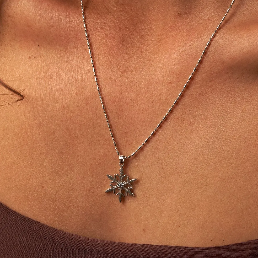 Blue Topaz Snowflake Necklace