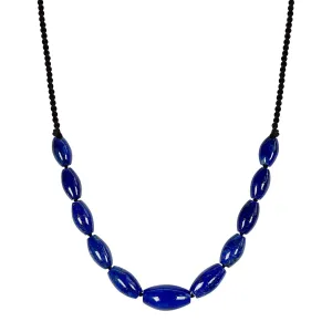 Eleven Graduated Oval Lapis Beads with 10K Gold Button