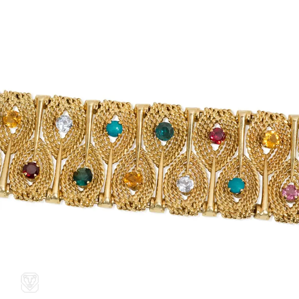 Gold stylized leaf and gemset bracelet
