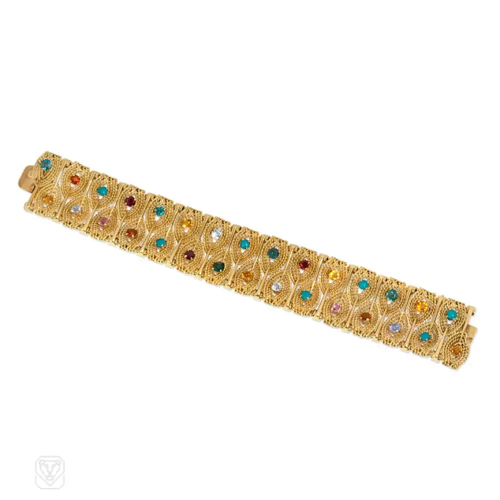 Gold stylized leaf and gemset bracelet