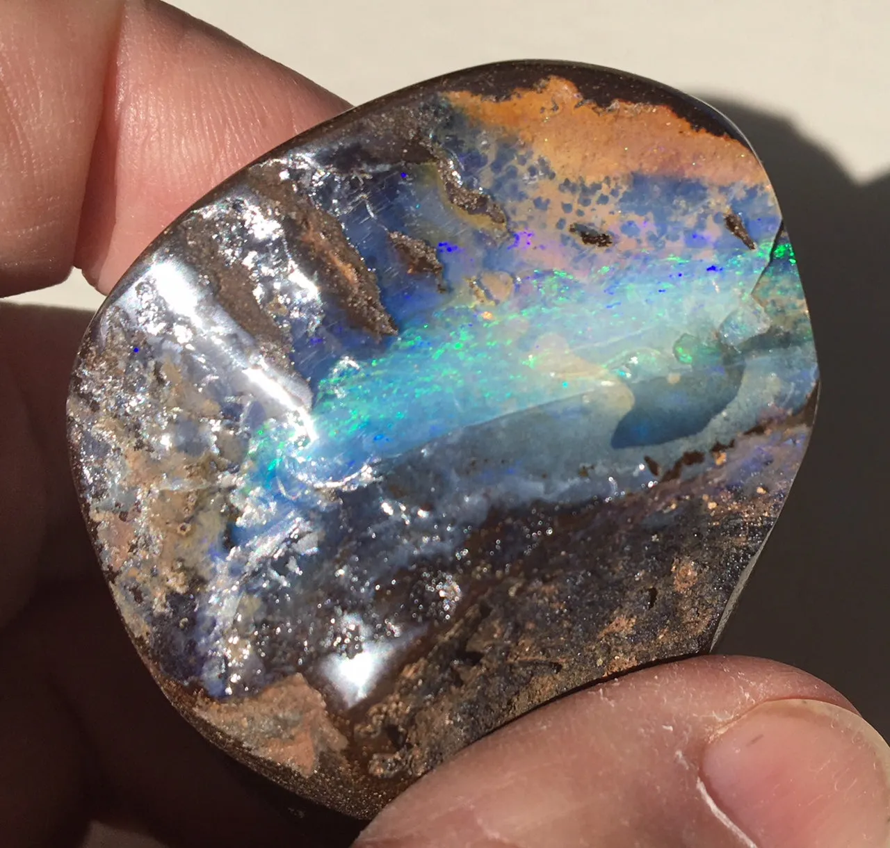Green boulder opal polished speciman