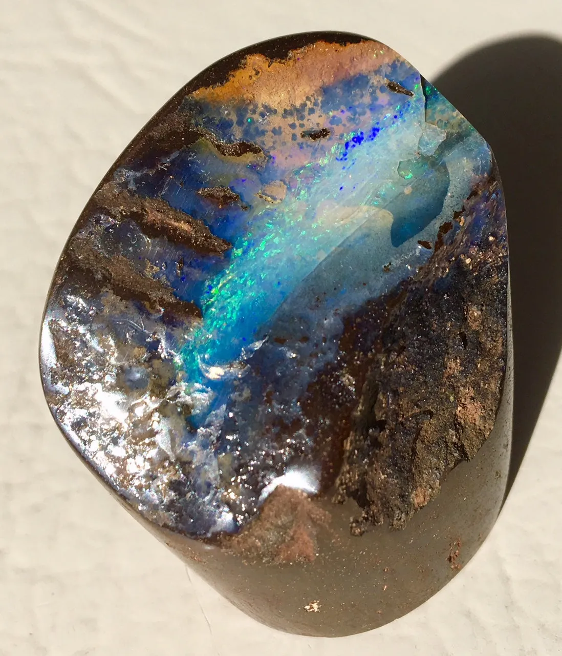 Green boulder opal polished speciman