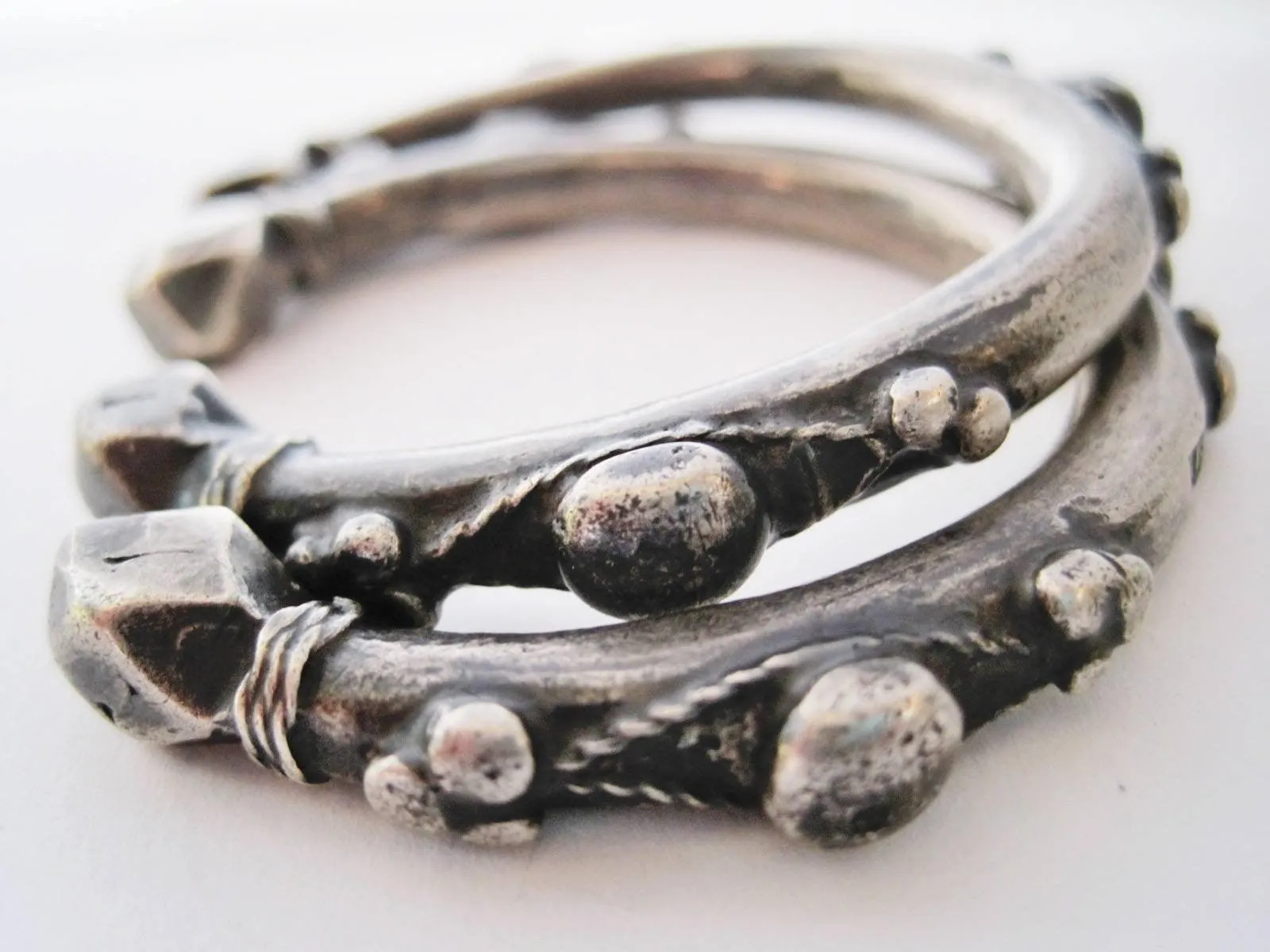 Matching Pair of Small Nubian Silver Currency Bracelets