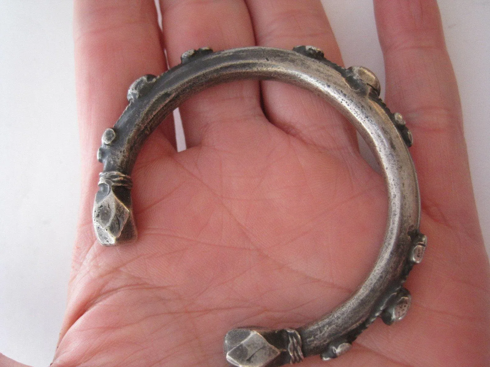 Matching Pair of Small Nubian Silver Currency Bracelets