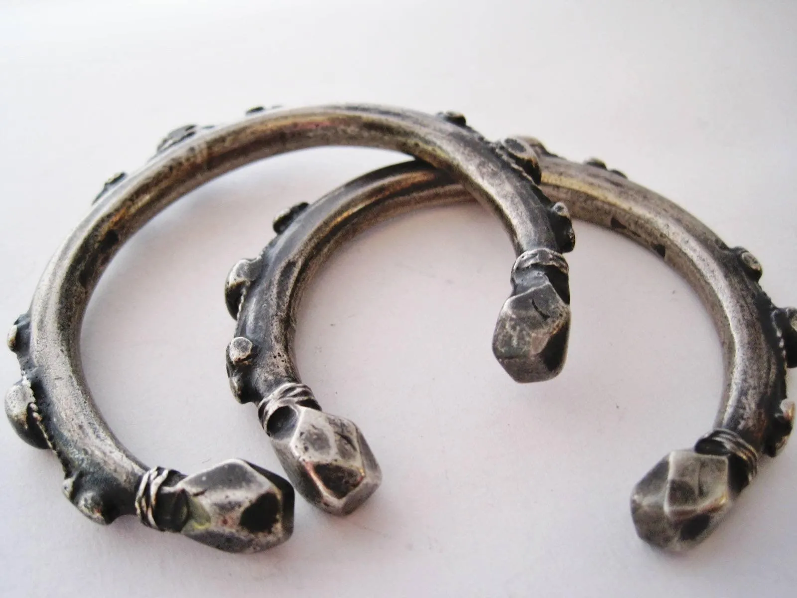 Matching Pair of Small Nubian Silver Currency Bracelets